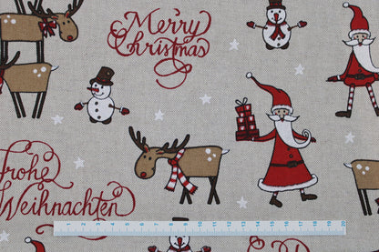 Canvasstoff Emil mit fröhlichen Weihnachtsmotiven auf beigem Grund Detailbild