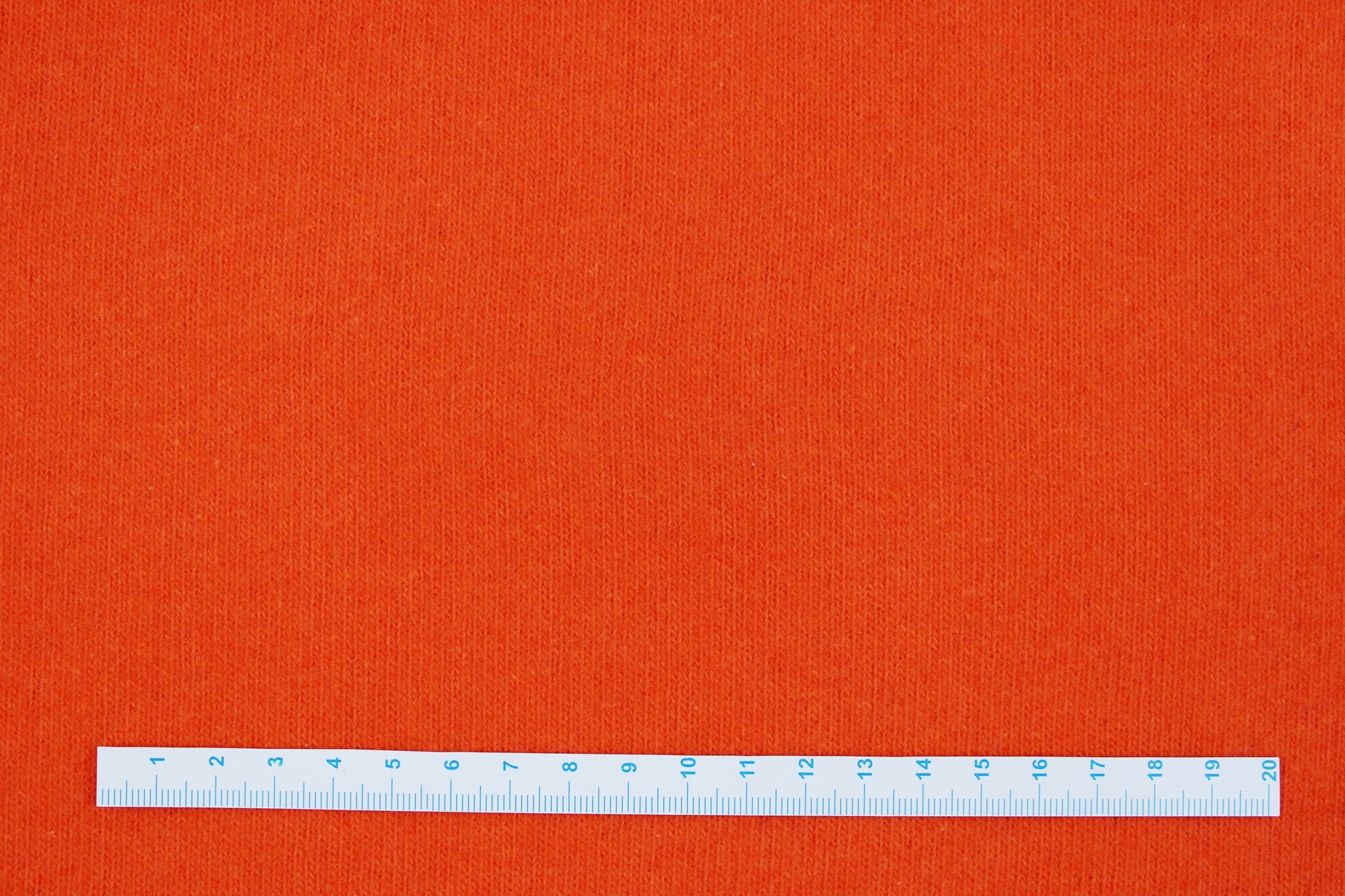 Feinstrick Gillo in uni orange Maßstab