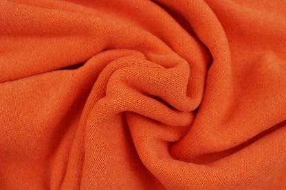 Feinstrick Gillo in uni orange gedreht