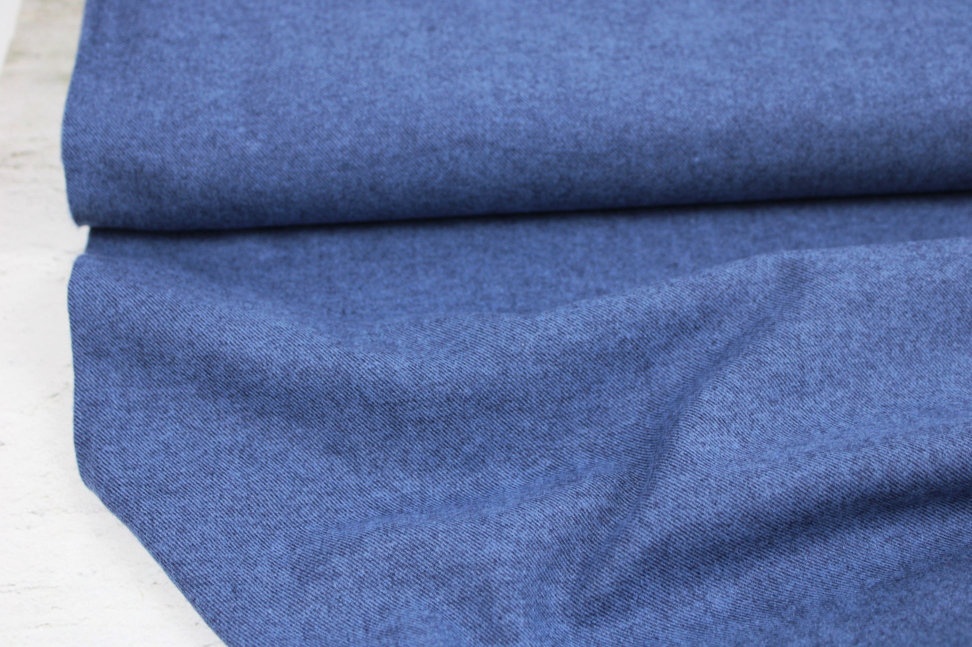 Flanellstoff Hudson uni blau meliert Ballenansicht