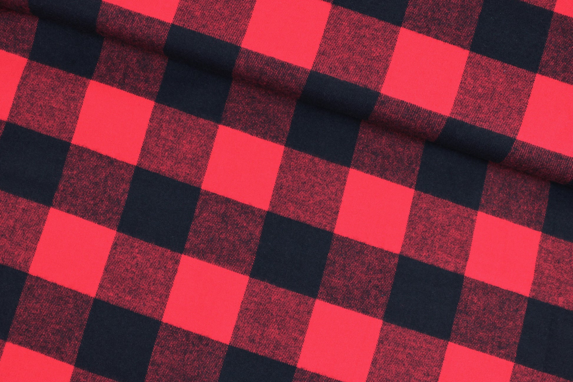 Flanellstoff Maverick mit aros in Rot und schwarz quer
