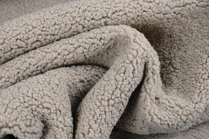 Teddystoff mit weicher Fleeceabseite in beige gedreht