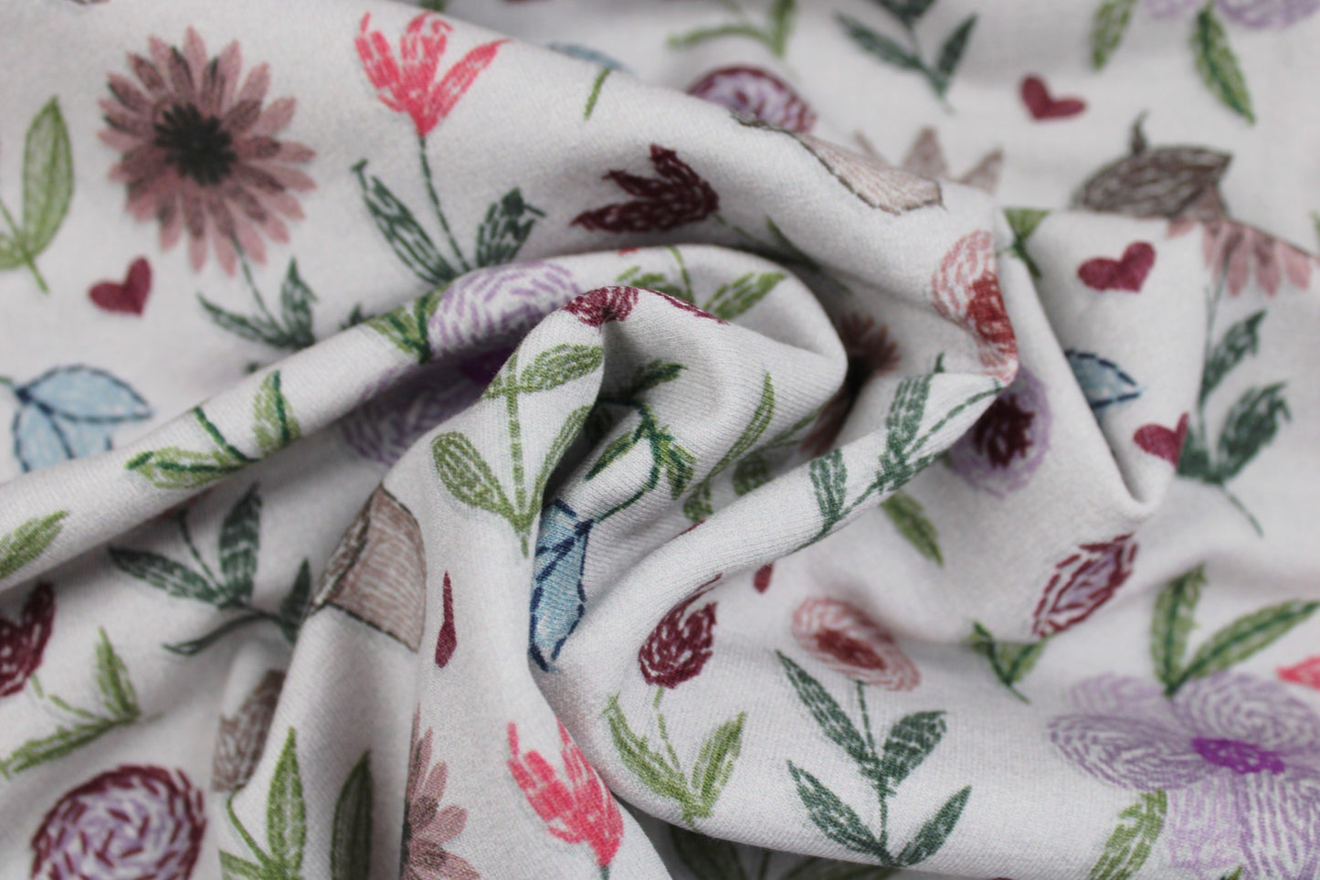 French Terry Sweatstoff Embroidery Flowers mit Stickmotiv als Druck gedreht