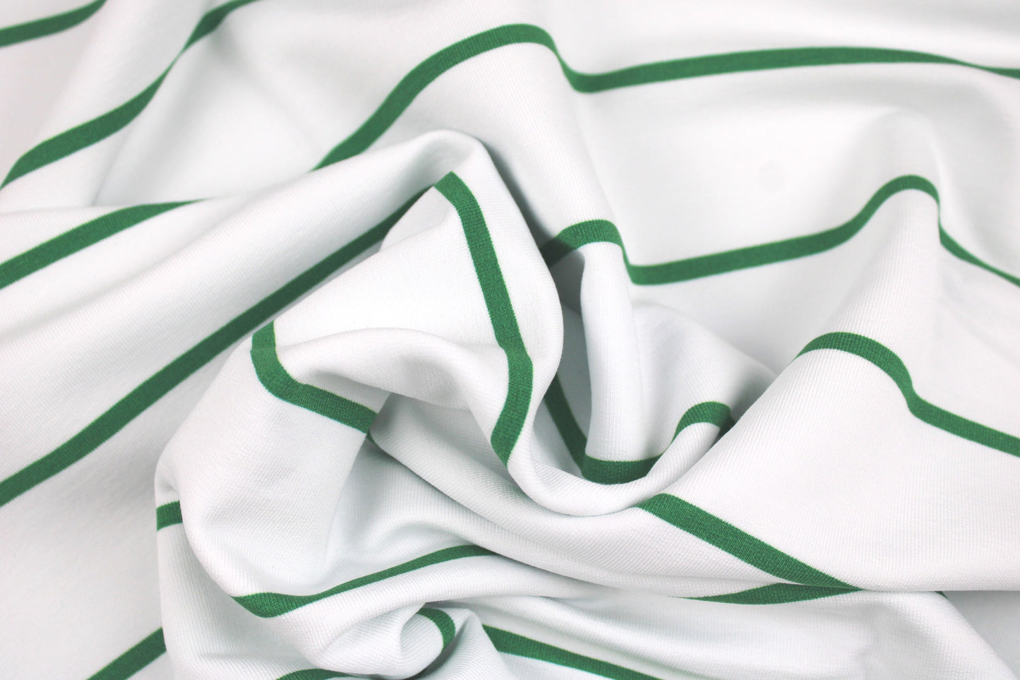 Modal Sweat Panelstoff Lineas mit Streifen in Grün auf Weiß gedreht