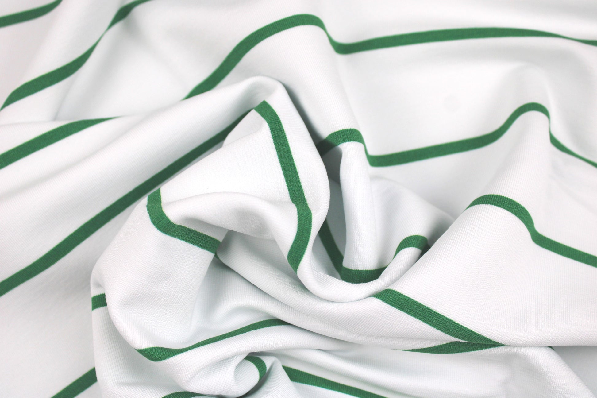 Modal Sweat Panelstoff Lineas mit Streifen in Grün auf Weiß gedreht