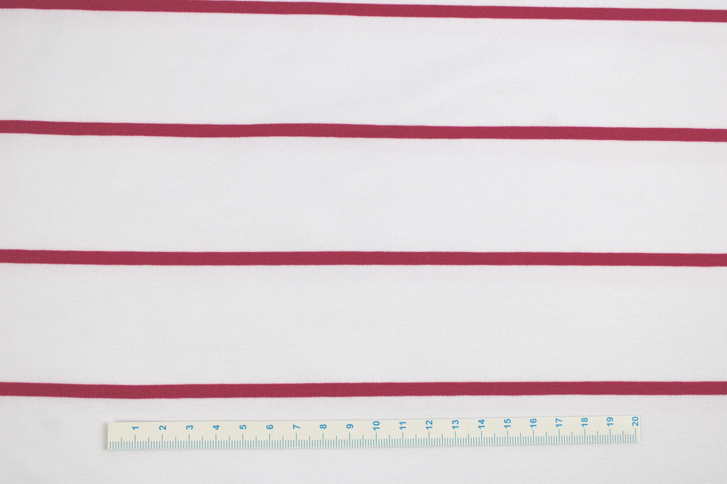 Modalsweat-Panel Lineas mit Streifen in Pink auf weißem Grund Maßstab
