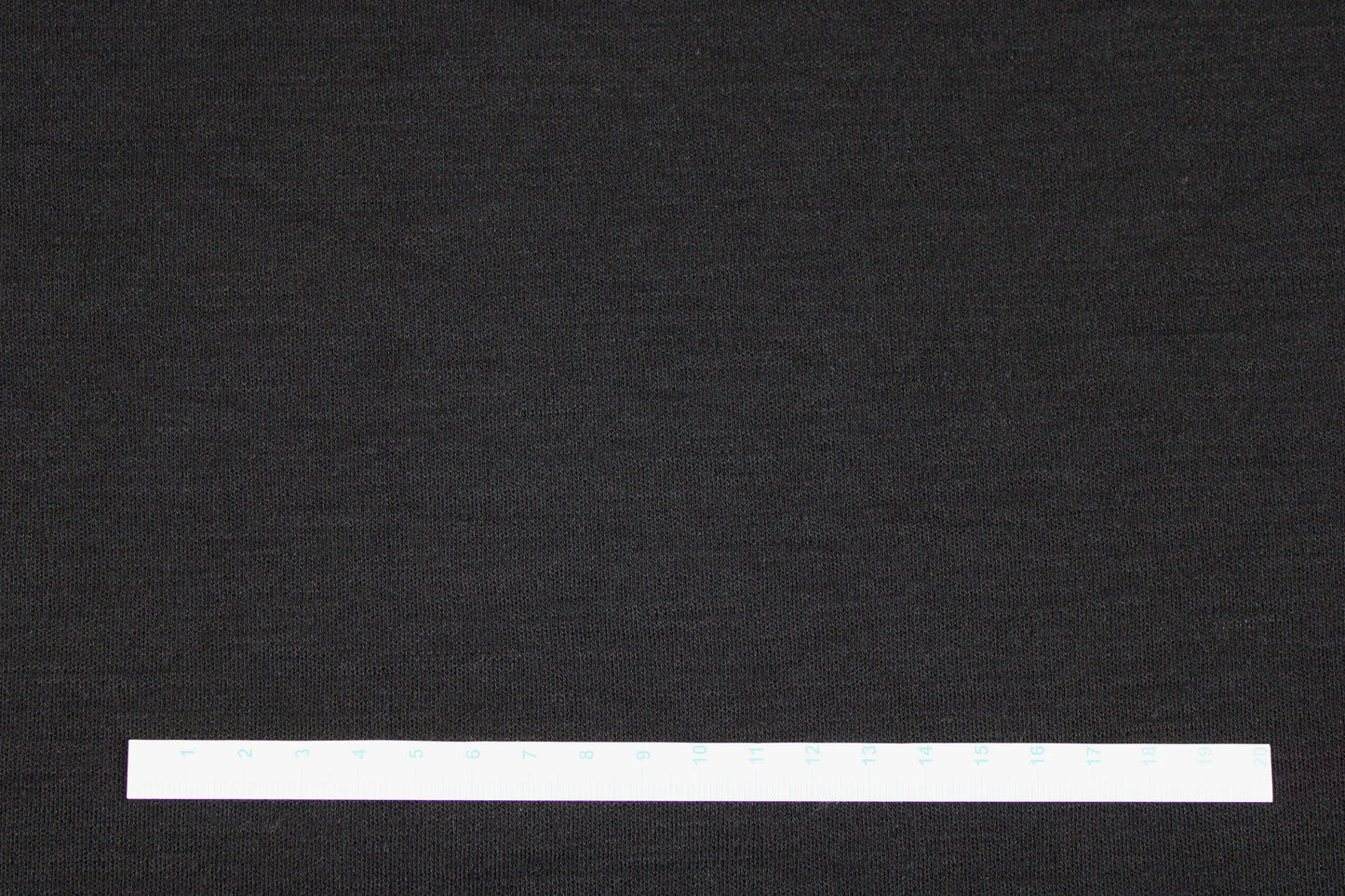 Merinostrickstoff Wolljersey in uni Schwarz Maßstab