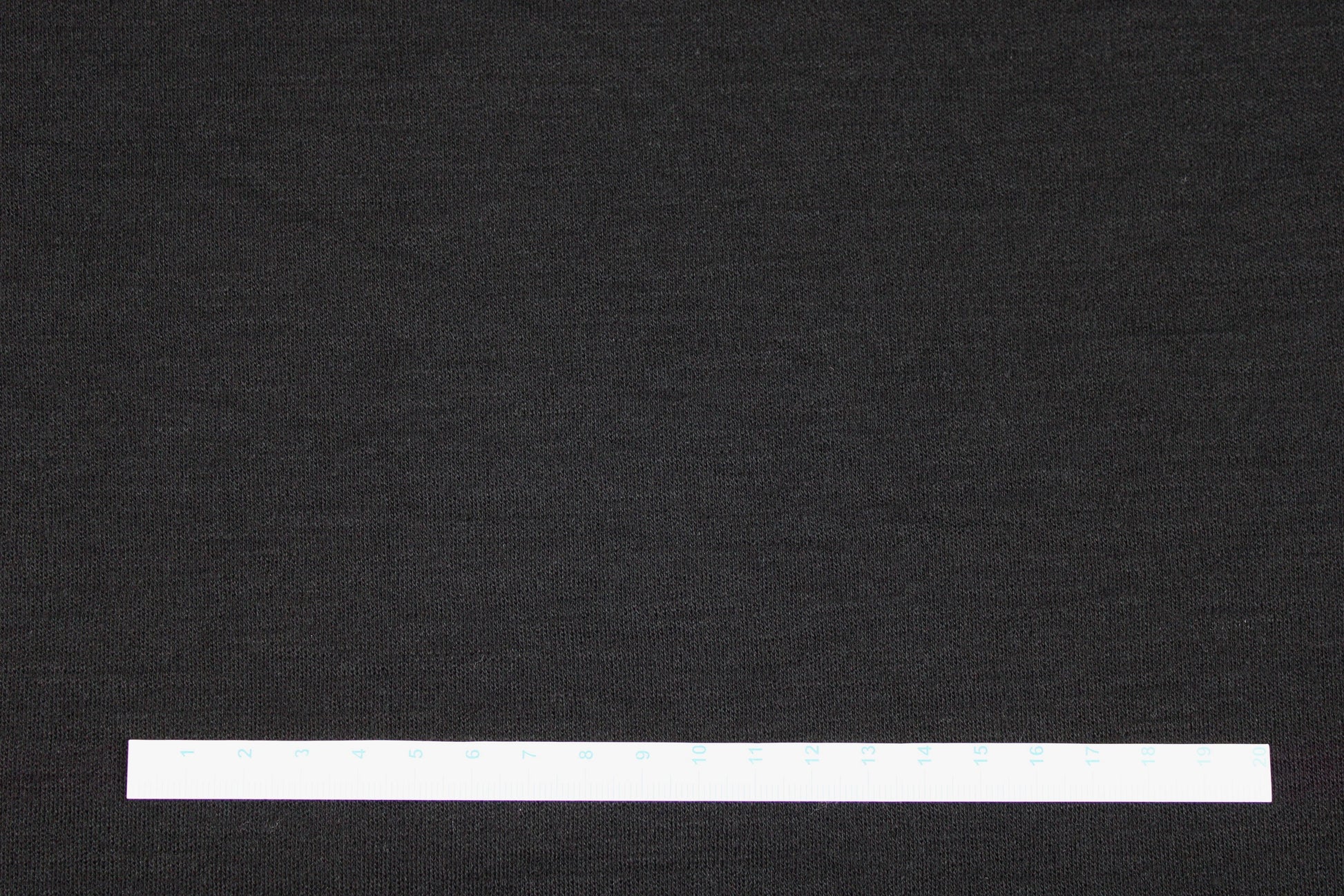 Merinostrickstoff Wolljersey in uni Schwarz Maßstab