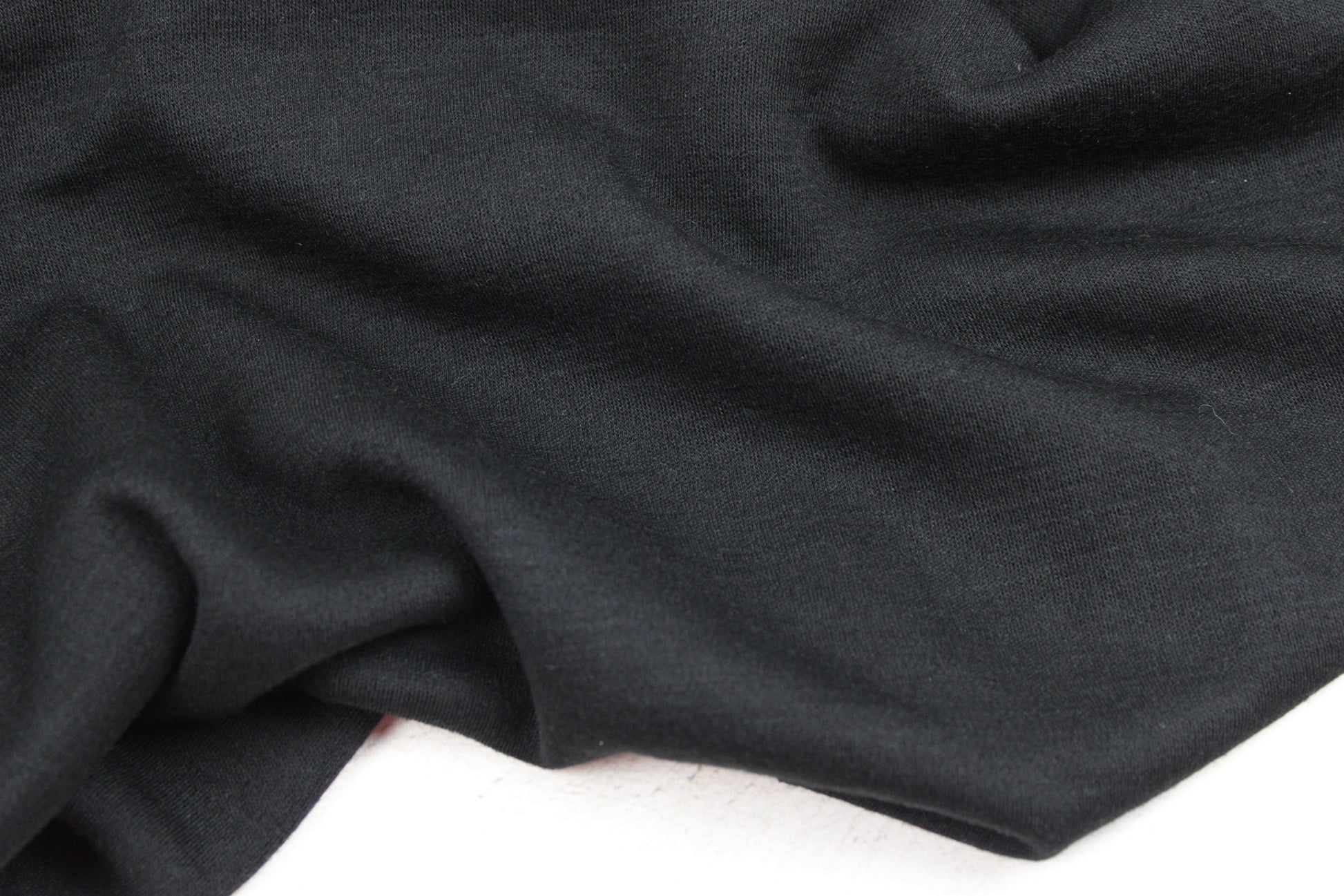 Merinostrickstoff Wolljersey in uni Schwarz