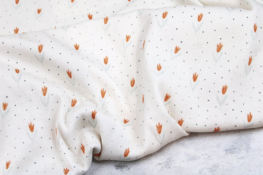 Wllweißer Rippjersey Jena mit kleinen Tulpen