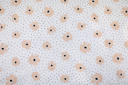 Wollweißer Rippjersey Jena mit kleinen Blüten in Apricot Detailbild