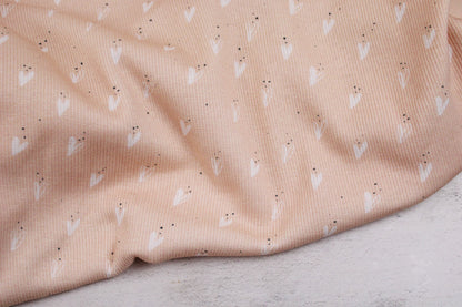 Rippjersey Jena mit hellen Herzen auf apricot farbeneme Grund