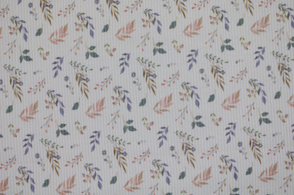 Ecru farbener Rippjersey Mia mit kleinen Blättern in Pastell Detailbild