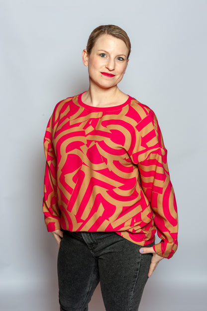 Viskosecrepe mit abstraktem Muster in pink-beige als Blusenshirt vernäht