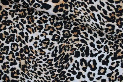 Viskosecrepe Stoff mit klassischem Leoprint in Beigetönen quer