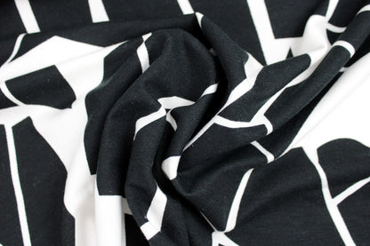 Viskosejersey Odd Puzzle in Schwarz, Weiß von mind the maker gedreht