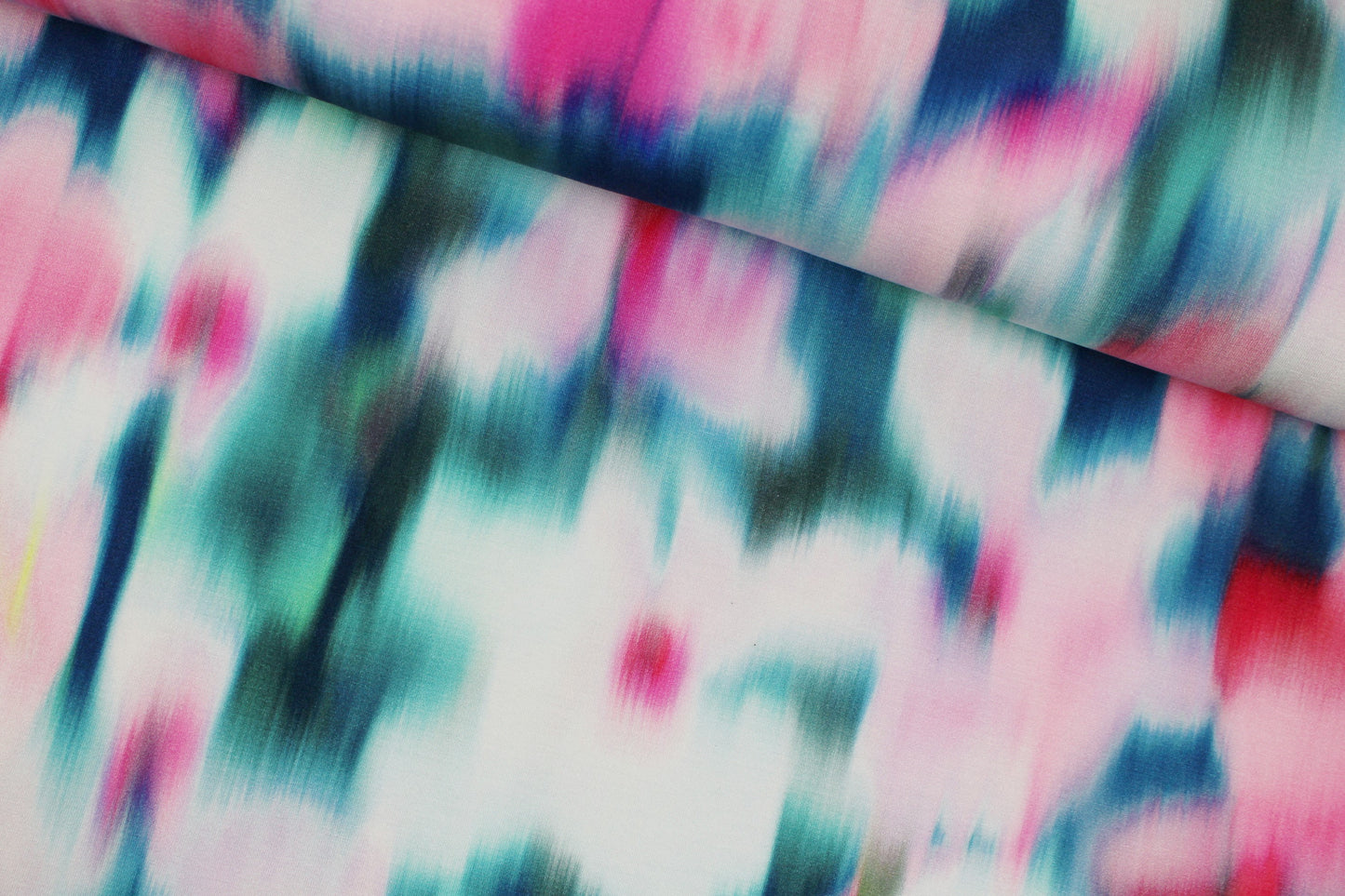 Viskosejersey Sizilien mit abstraktem Blumenmuster in Petrol und Pink quer