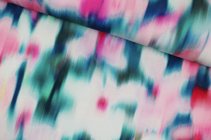 Viskosejersey Sizilien mit abstraktem Blumenmuster in Petrol und Pink quer