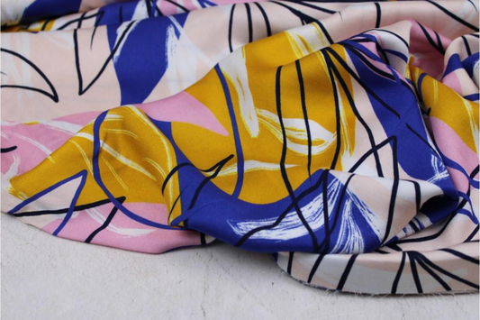 Viskosestoff Shelly mit buntem Blättermotiv