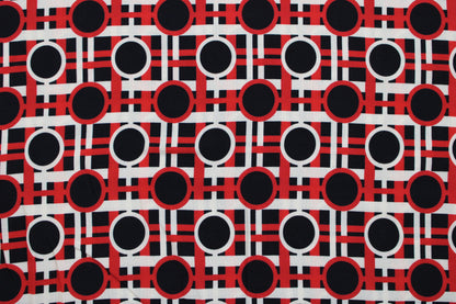 Viskosestoff mit Retromuster in rot-schwarz-beige Detailansicht
