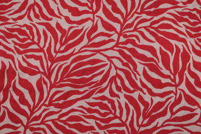 Viskosestoff Zebra Jungle mit Blätterprint in Koralle und Ecru Detailbild