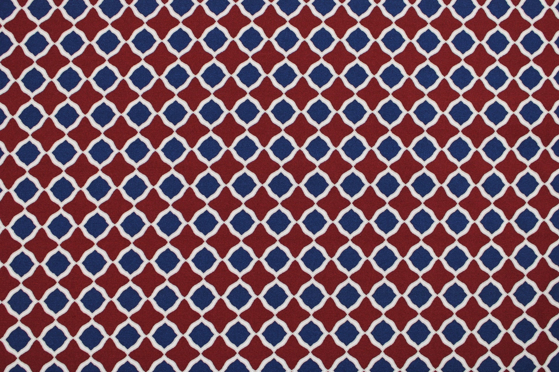 Viskosestretchstoff mit Retromuster in Rostot und Dunkelblau Detailbild