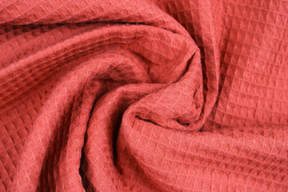 Waffelpique Nelson in uni Terracotta gedreht