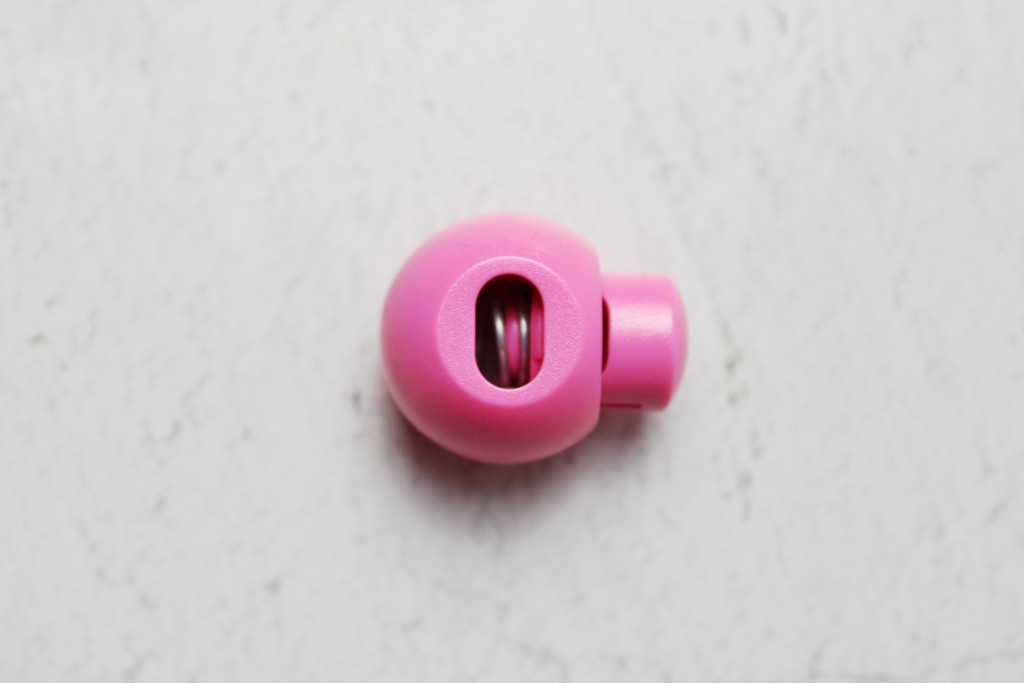 Kordelstopper 1-loch, 18mm rund aus Kunststoff, rosa